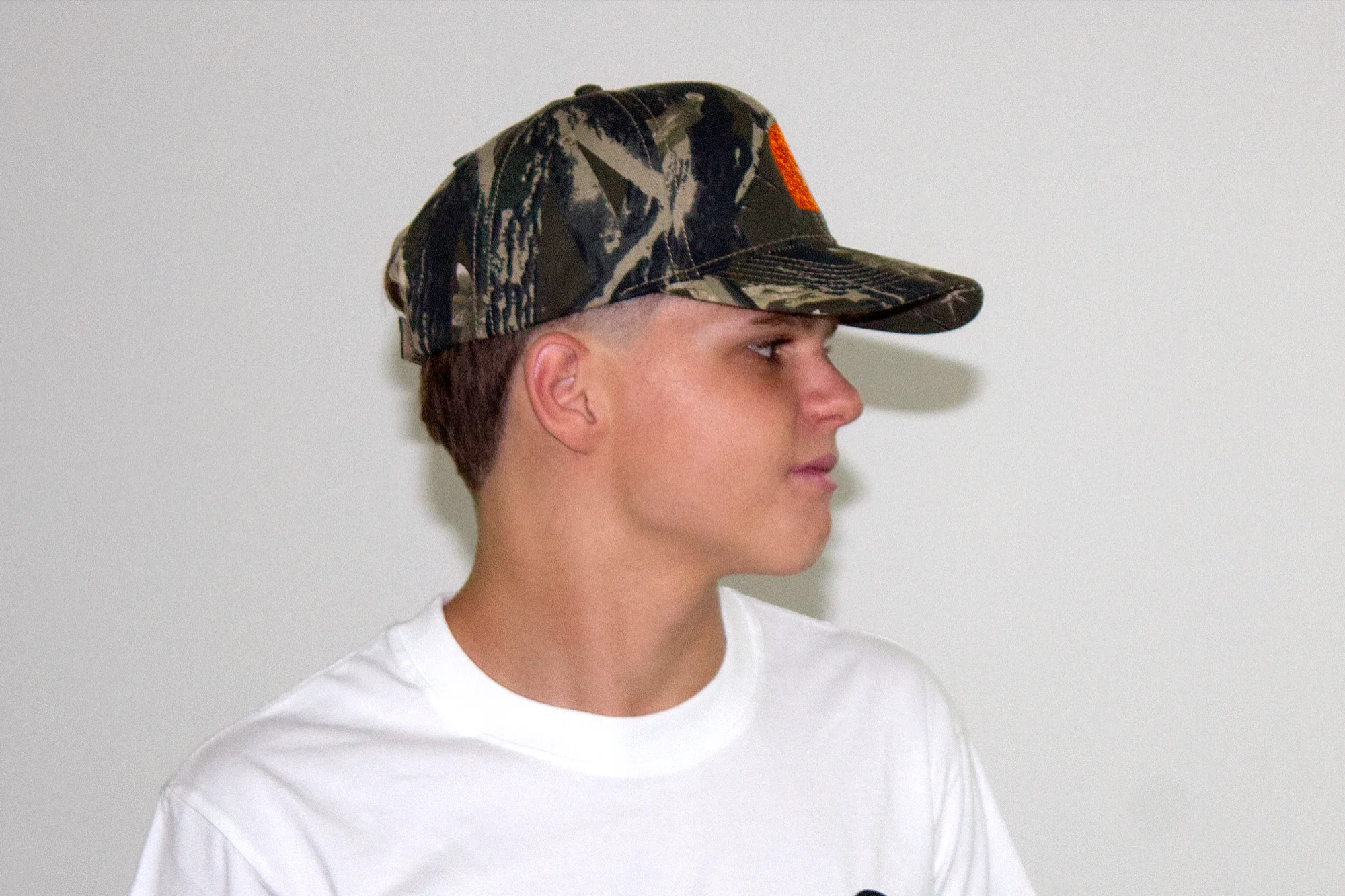 EMVŸ camo cap in profile from the other side