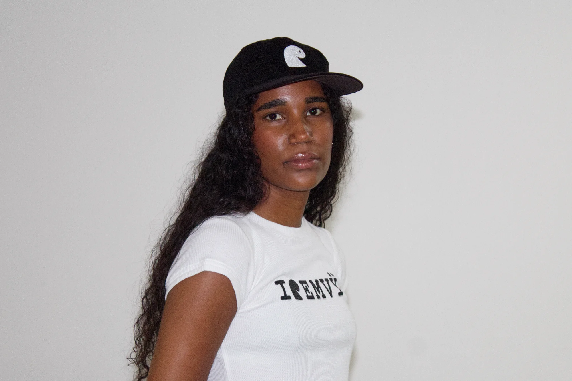 Black corduroy cap from a three-quarter angle