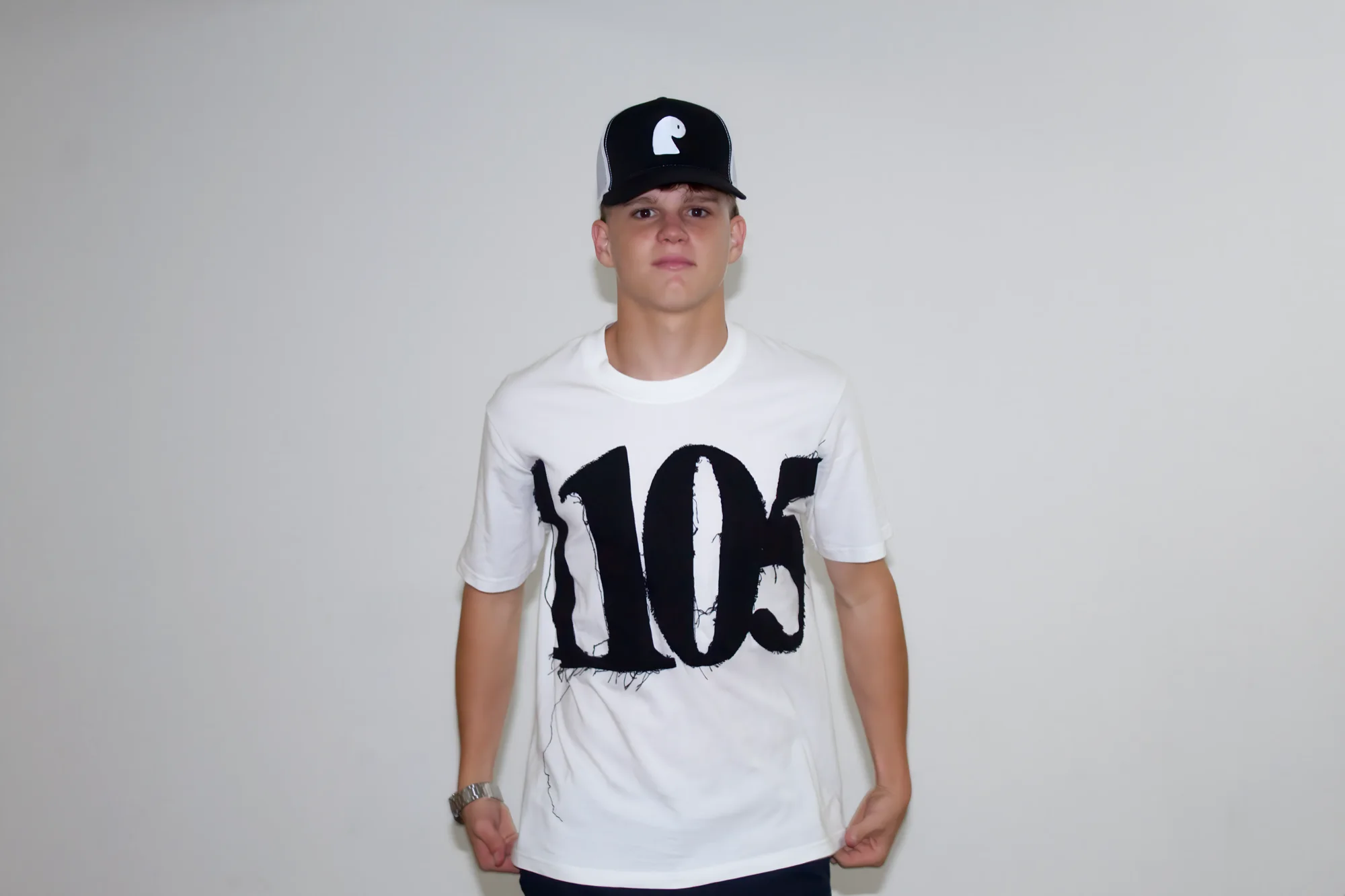 NMBRS T-shirt worn front-on, the 1105 denim patchwork across the chest